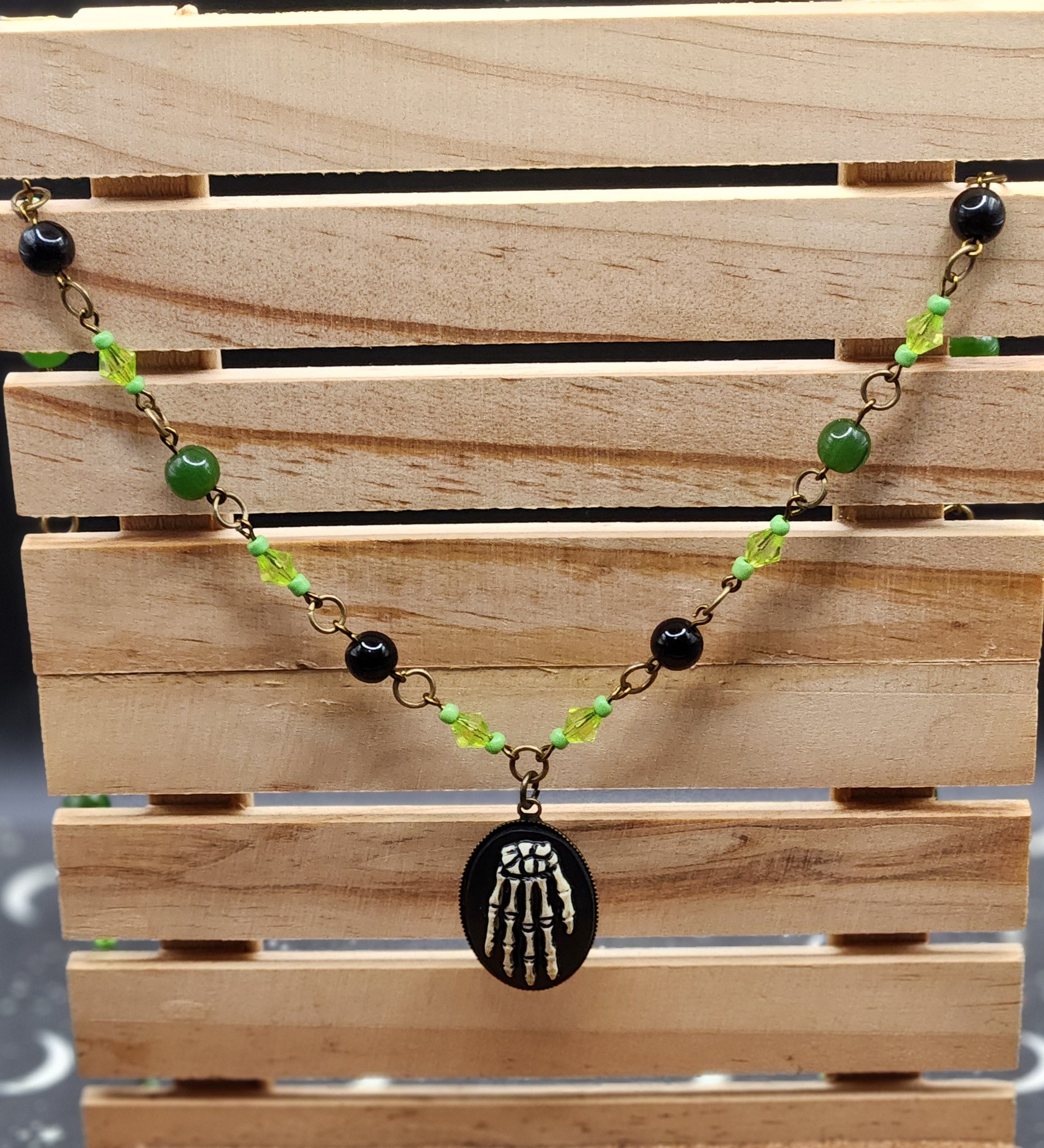 Skeleton hand necklace