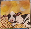 Calf on a bed of straw